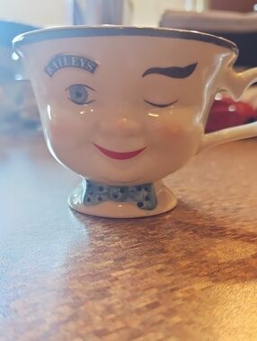 Bailey's Male Ceramic Winking Teacup - Cream with Blue Accents